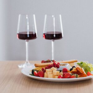 Bottle of housewine and cheese plate for two